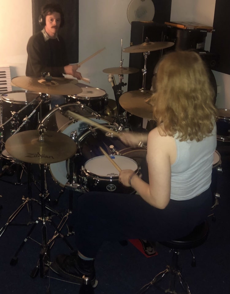 Teaching a student to play along to their favourite song